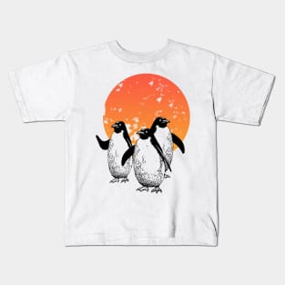 Funny penguins in the sun Kids T-Shirt